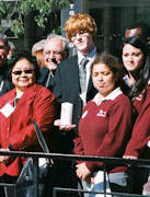 Setsuko Thurlow, Hiroshima atomic bombing survivor, Father Massey Lombardi, and students during the Peace Garden celebrations on September 29/2009. Thurlow & Lombardi were instrumental in helping to establish the Toronto Peace Garden in 1984